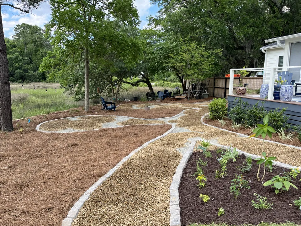 Curving gravel paths around mulched garden beds